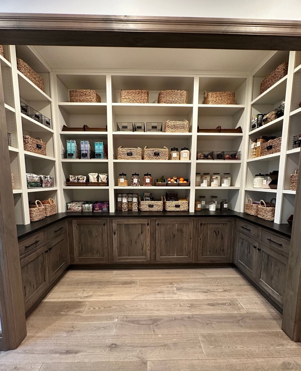 Rustic walk-in pantry with dark walnut cabinets, Cove Neck Long Island