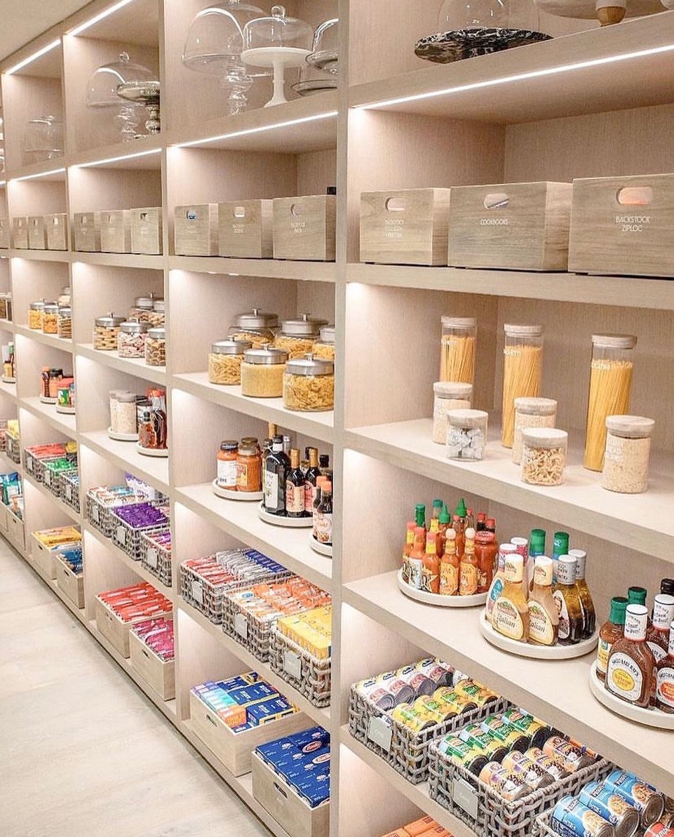 Grand pantry with LED lighting and turntable organizers, Old Westbury Long Island